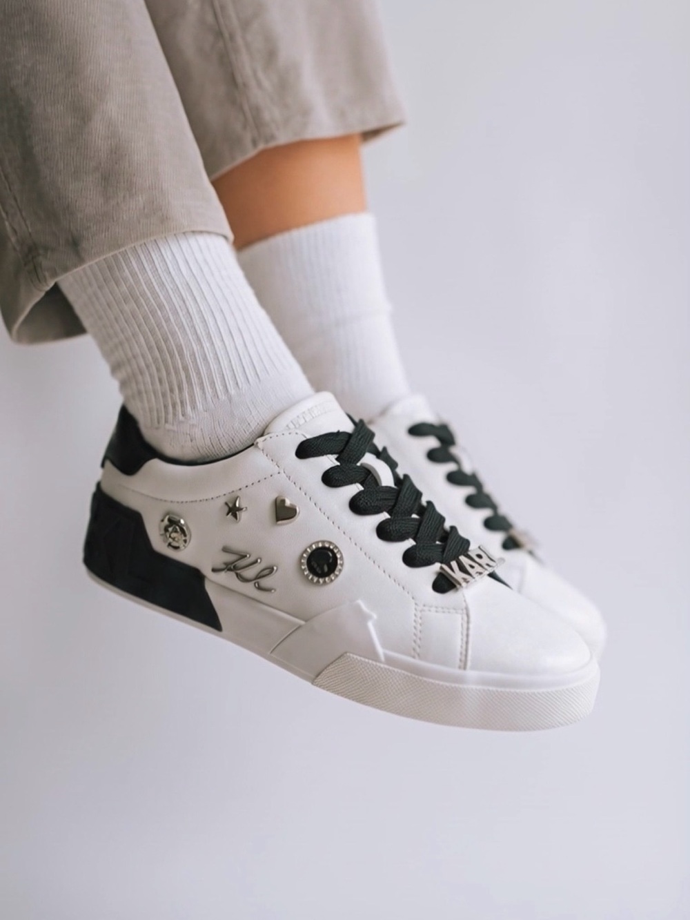 Karl Lagerfeld White and Black Low-Top Sneakers with Logo Charms